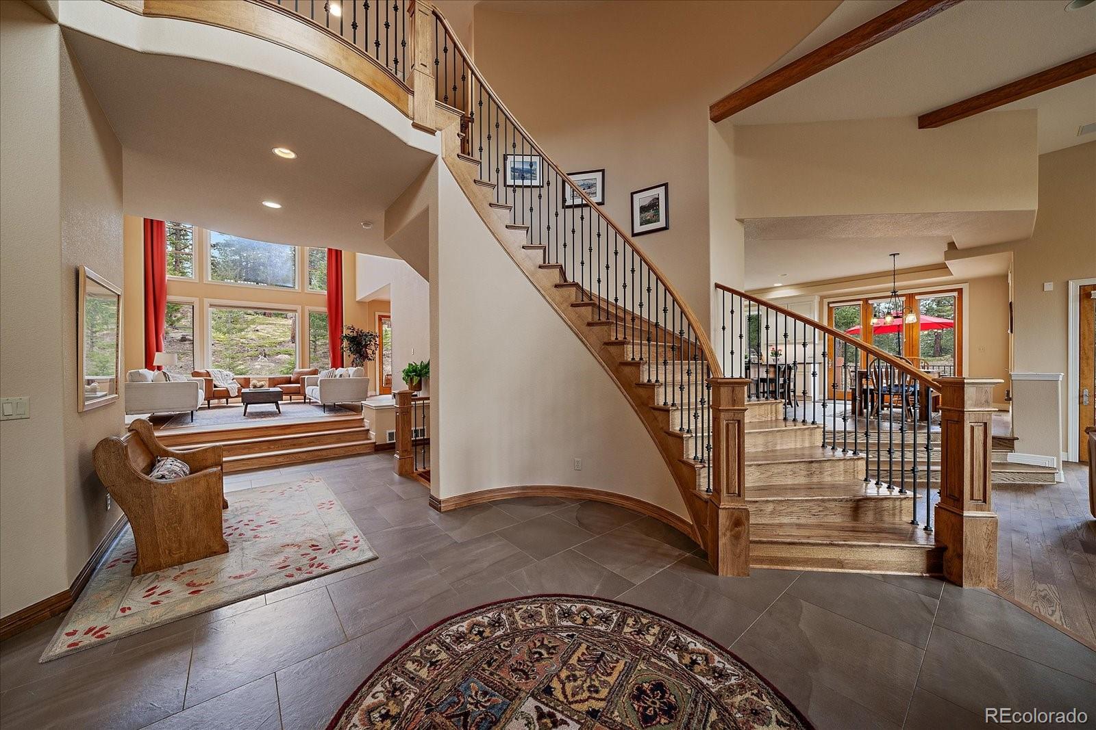 6737 Timbers Drive Evergreen, CO 80439 - Photo 5 of 47 a view of entryway and hall