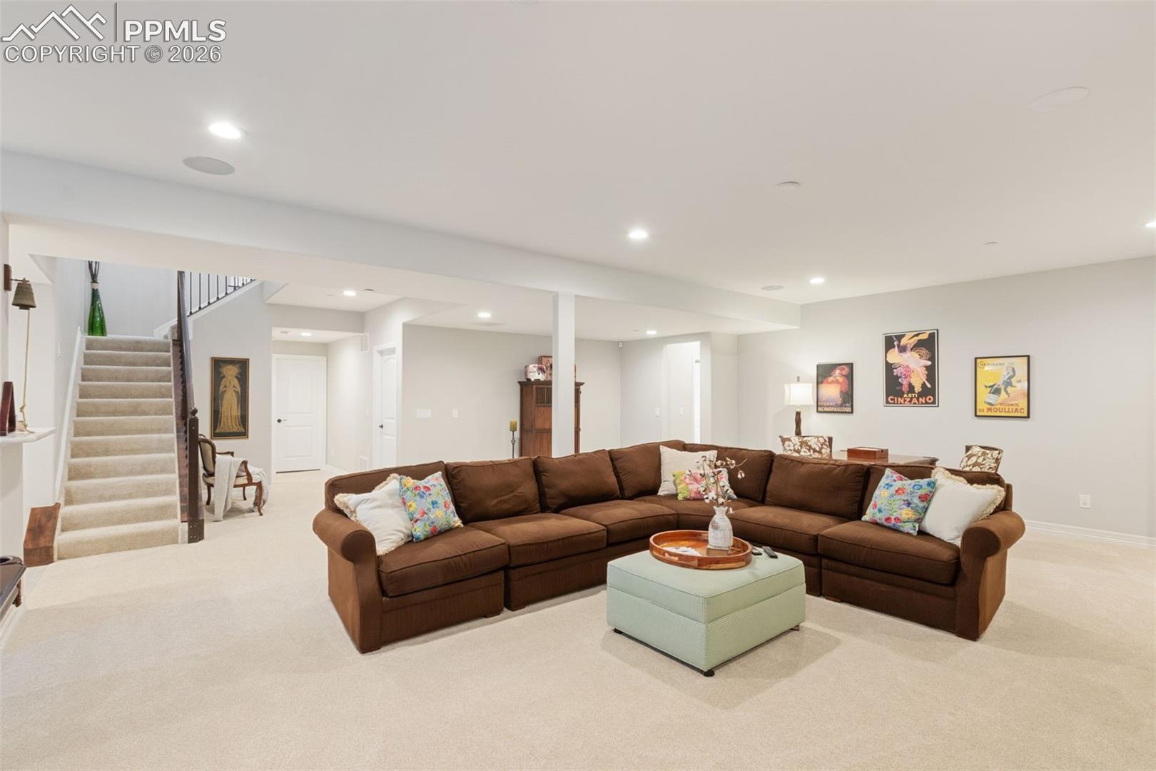 5318 Rocking Tree Grove Colorado Springs, CO 80906 - Photo 25 of 49 The finished basement expands the home's living footprint dramatically, offering a massive open-concept living space that acts as a secondary, casual family room