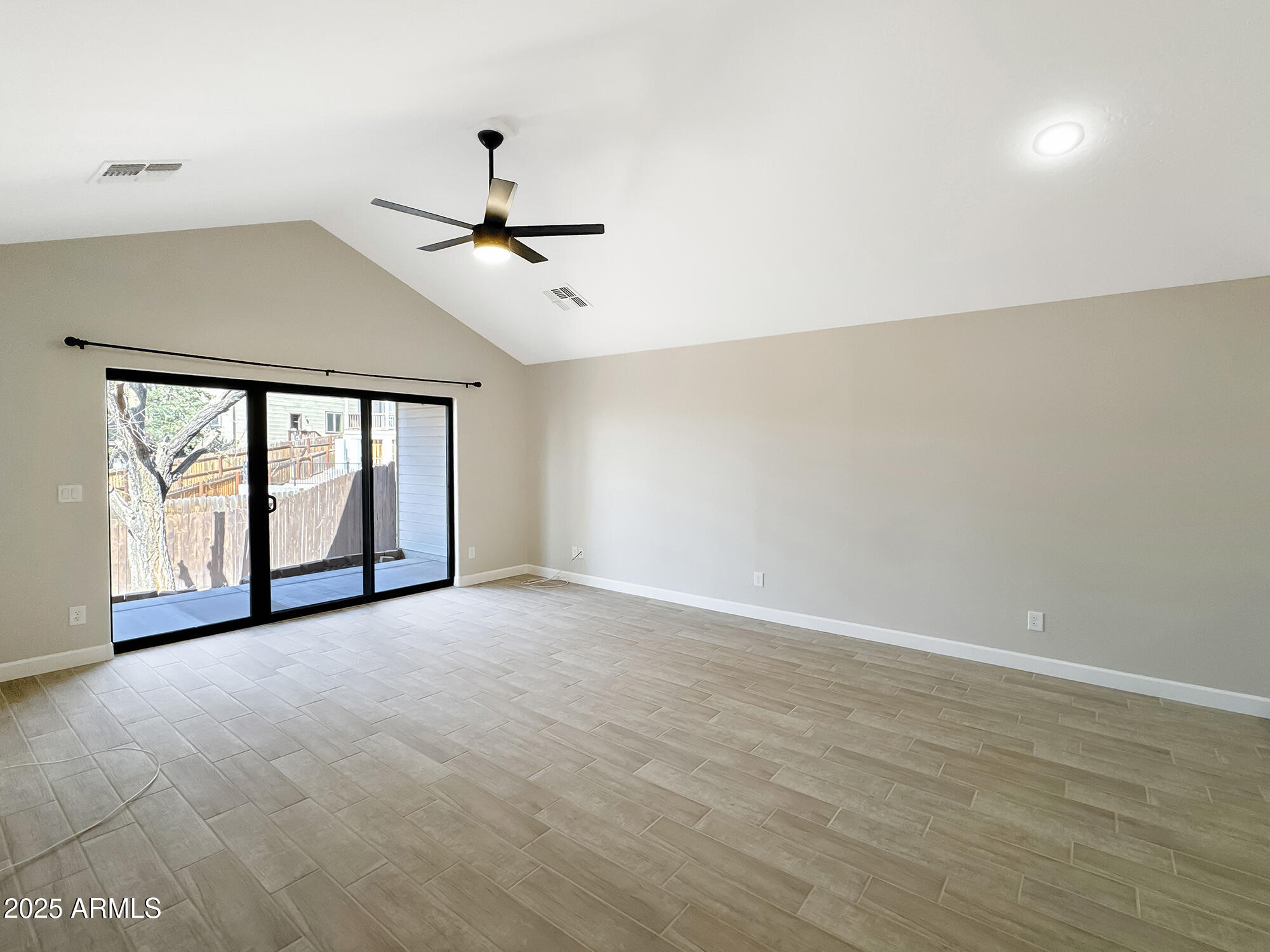 321 South Golden Bear Point Payson, AZ 85541 - Photo 4 of 23 wooden floor in an empty room with a window