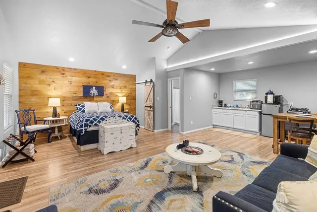 a kitchen with a table and chairs