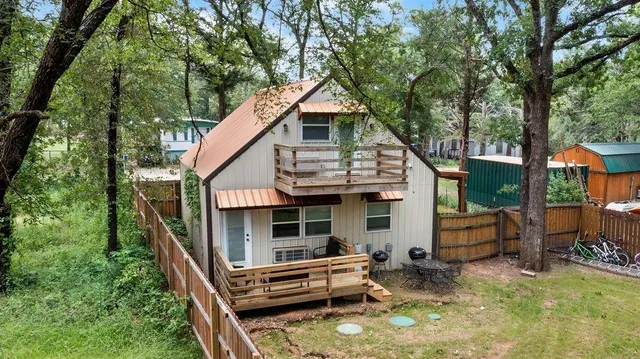 a backyard of a house with seating space