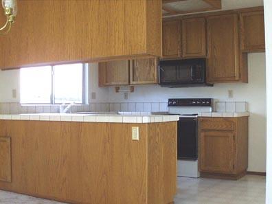 2058 Pinercrest Drive Santa Rosa, CA 95403 - Photo 8 of 11 a kitchen with stainless steel appliances granite countertop a sink a stove and a microwave
