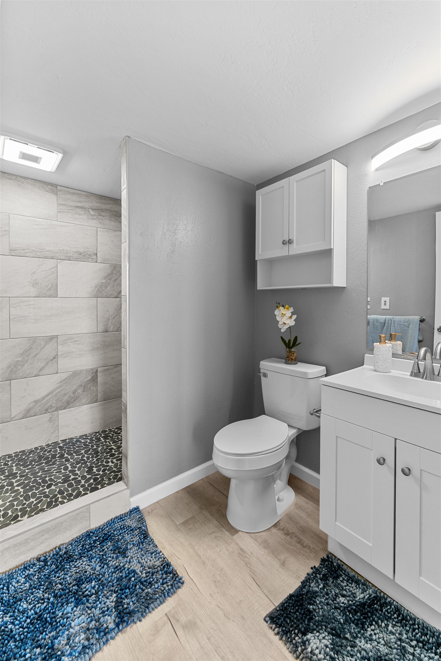 111 Kahului Beach Road, Unit D309 Kahului, HI 96732 - Photo 13 of 26 a bathroom with a sink toilet and shower