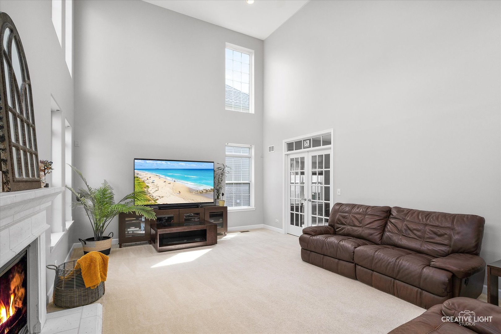 5912 Mackinac Lane Hoffman Estates, IL 60192 - Photo 11 of 32 a living room with furniture and a flat screen tv