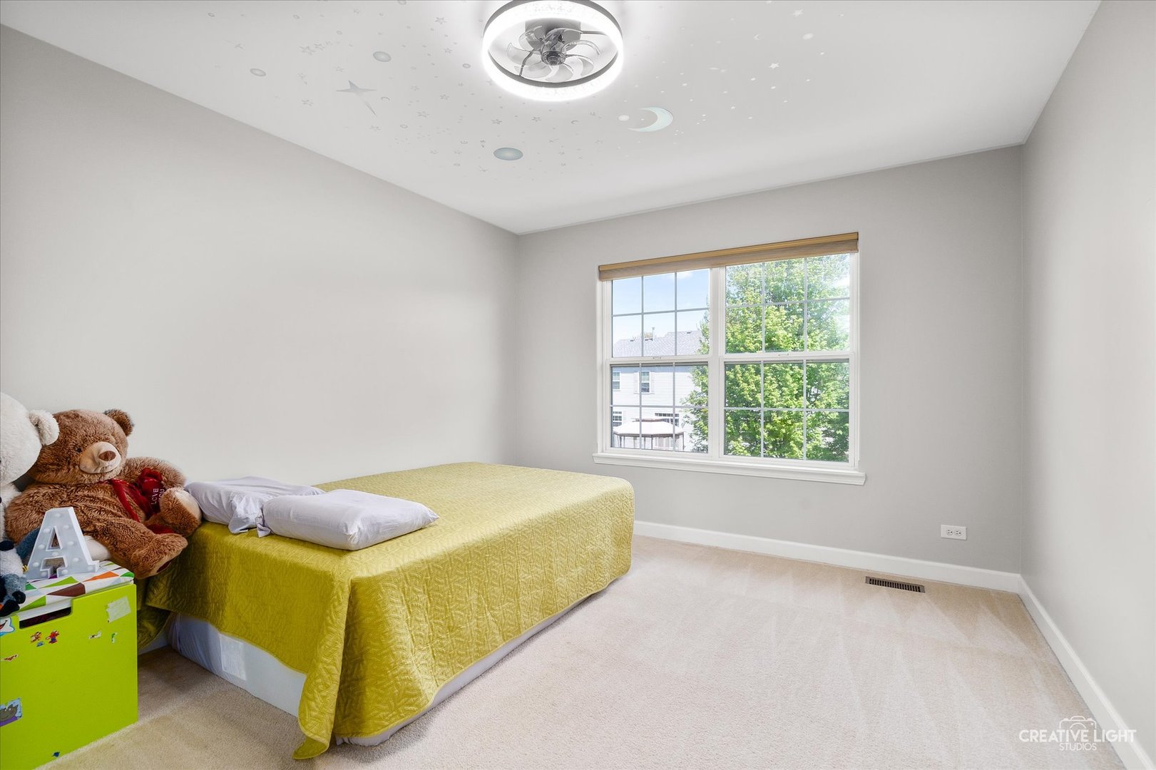 5912 Mackinac Lane Hoffman Estates, IL 60192 - Photo 17 of 32 a bedroom with a bed and a window