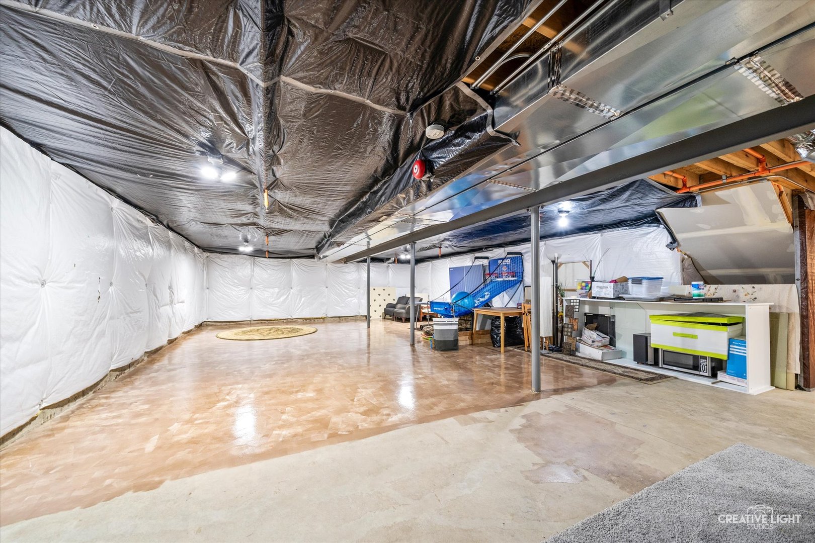 5912 Mackinac Lane Hoffman Estates, IL 60192 - Photo 23 of 32 a view of a studio with wooden floor