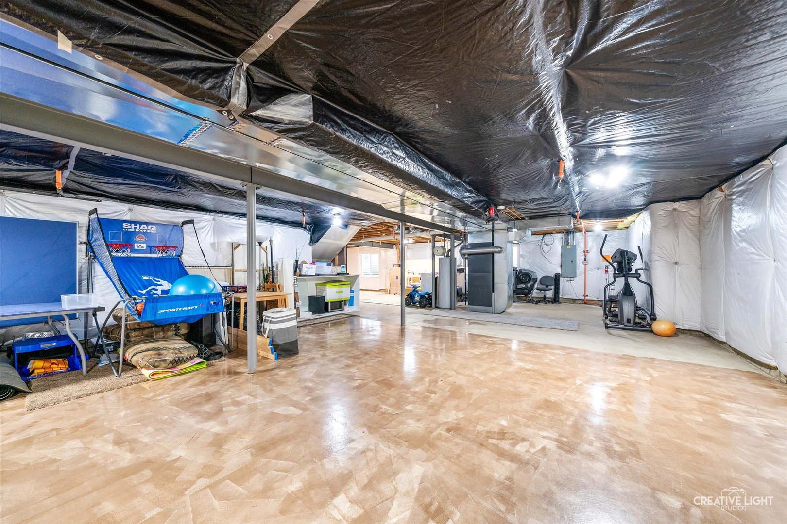 5912 Mackinac Lane Hoffman Estates, IL 60192 - Photo 24 of 32 a view of a room with gym equipment