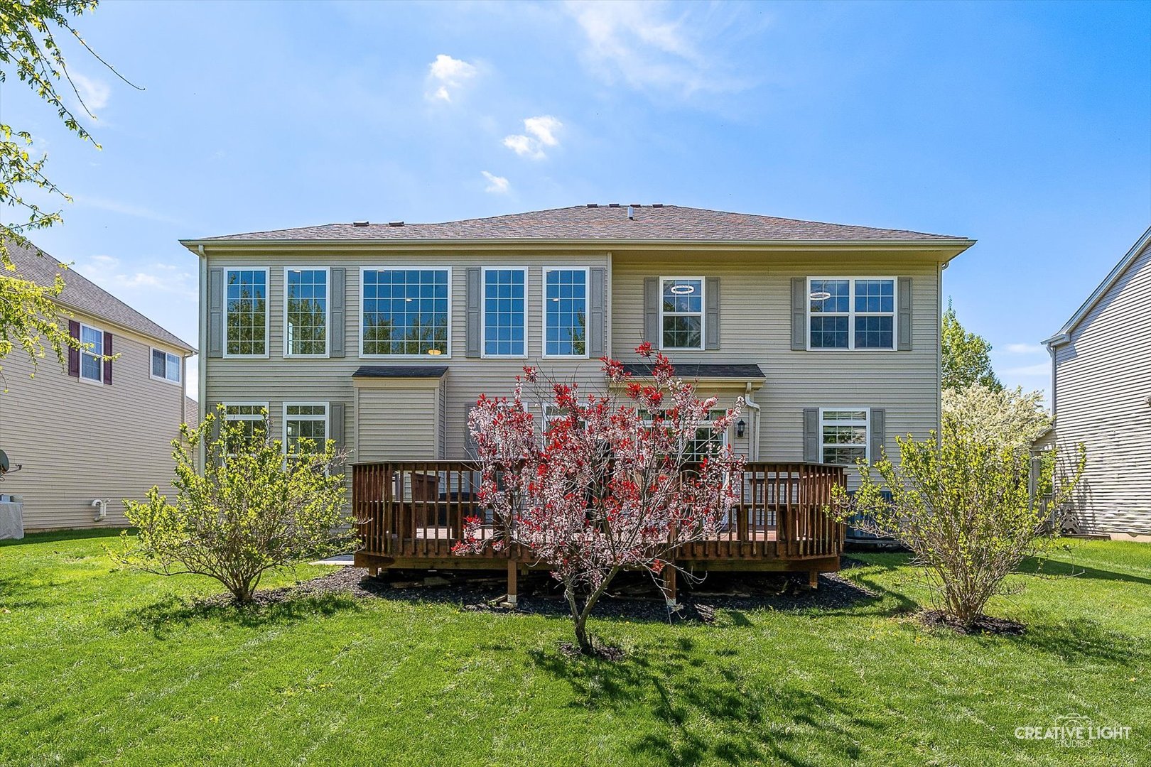 5912 Mackinac Lane Hoffman Estates, IL 60192 - Photo 26 of 32 a front view of a house with a yard