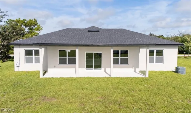 aerial view of a house with a swimming pool