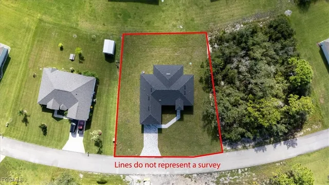 an aerial view of residential building with outdoor space