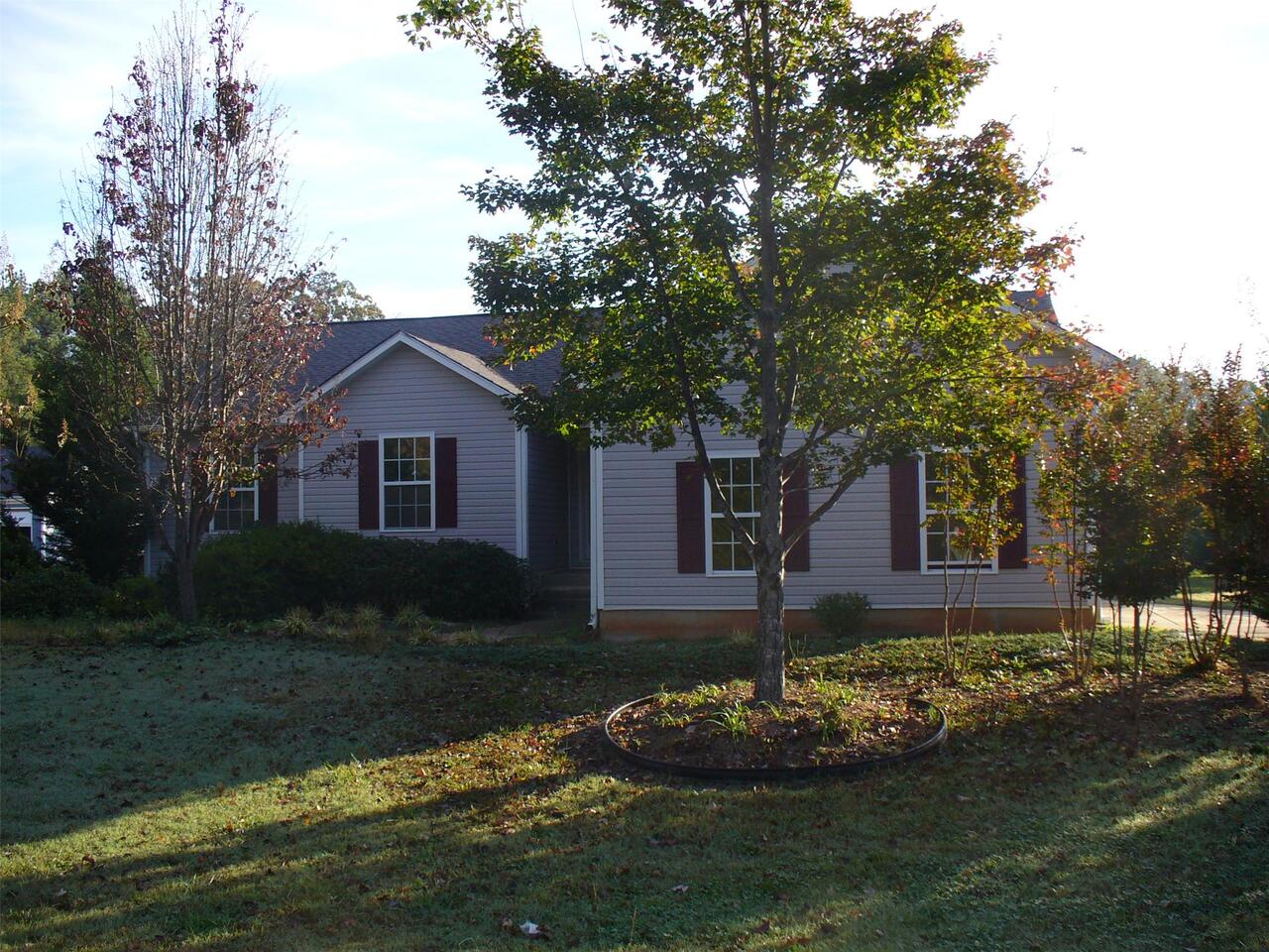 700 Russell Ridge Road, Unit 1 Winder, GA 30680 - Photo 1 of 1 a front view of a house with a garden