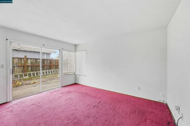 a kitchen with granite countertop a sink and a stove
