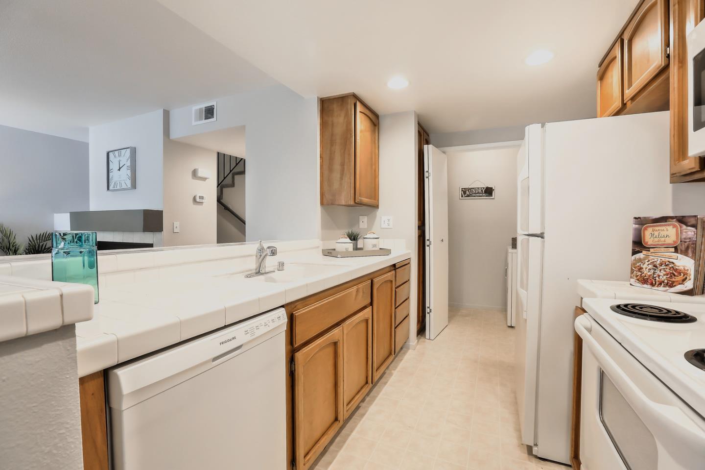 1925 Vista Cay San Mateo, CA 94404 - Photo 12 of 24 a bathroom with a sink and a mirror