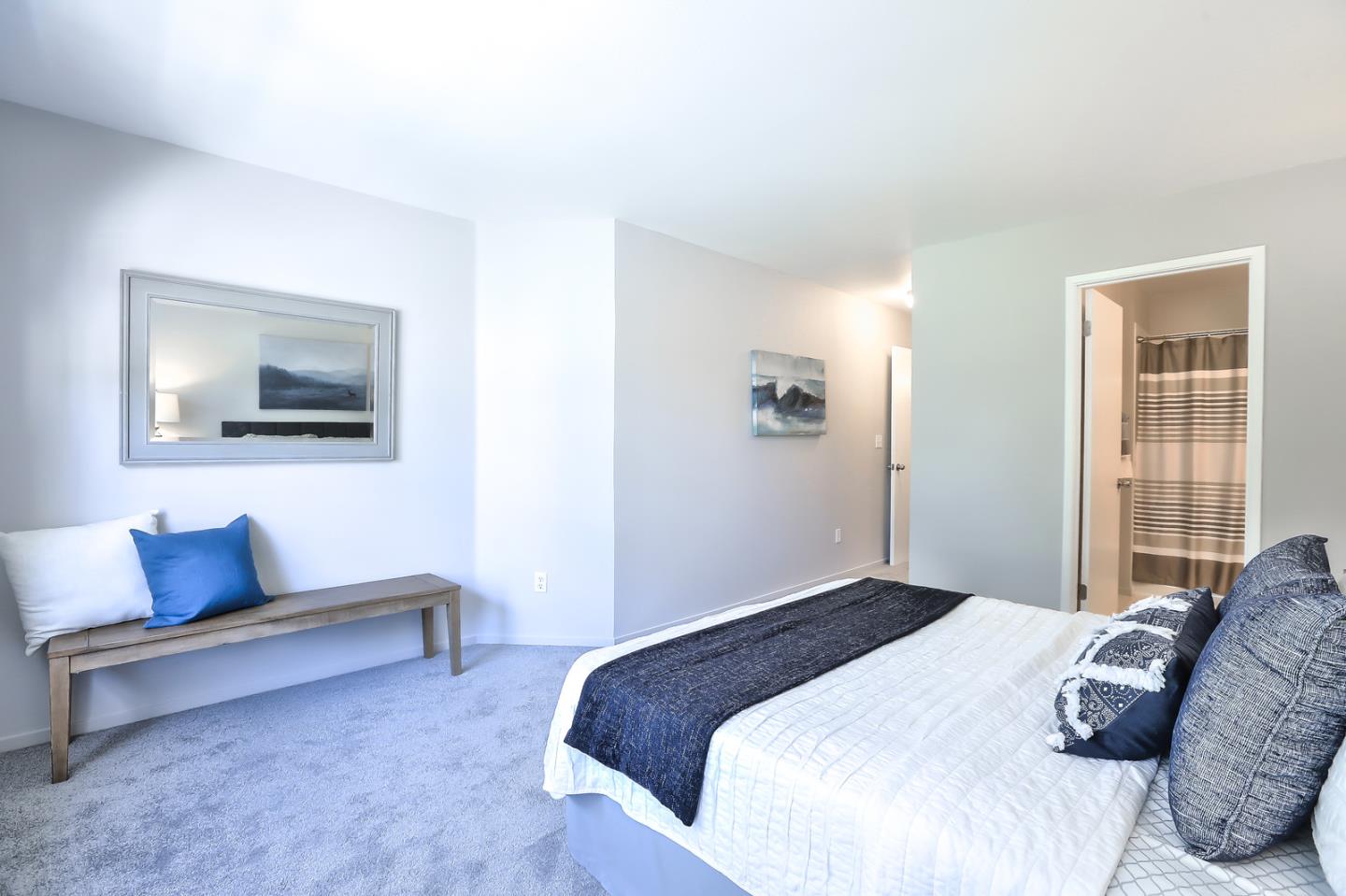 1925 Vista Cay San Mateo, CA 94404 - Photo 15 of 24 a bedroom with a bed and a couch