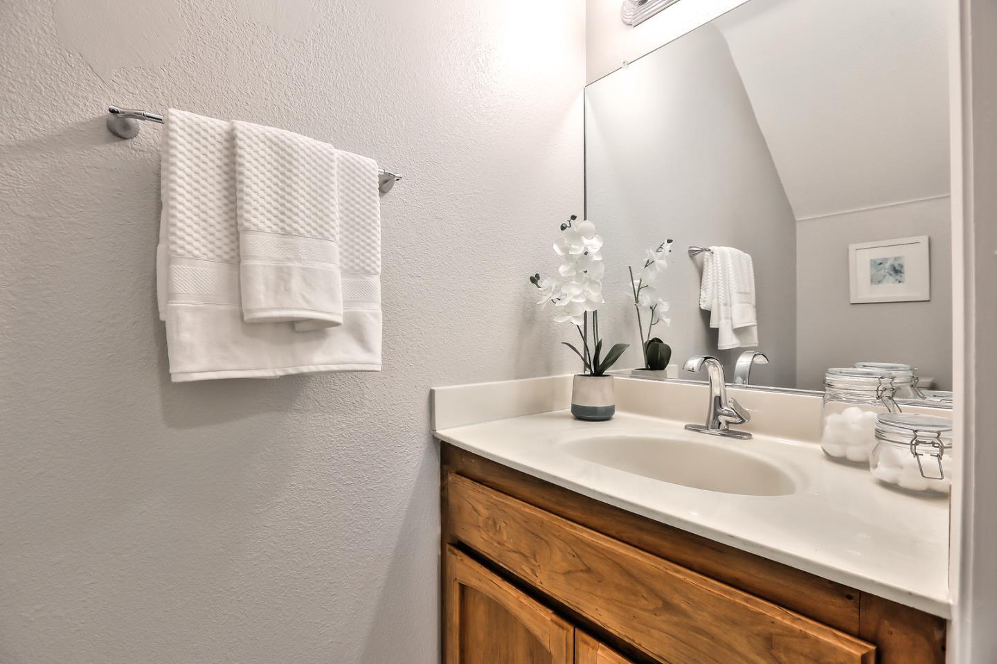 1925 Vista Cay San Mateo, CA 94404 - Photo 19 of 24 a bathroom with a sink and a mirror