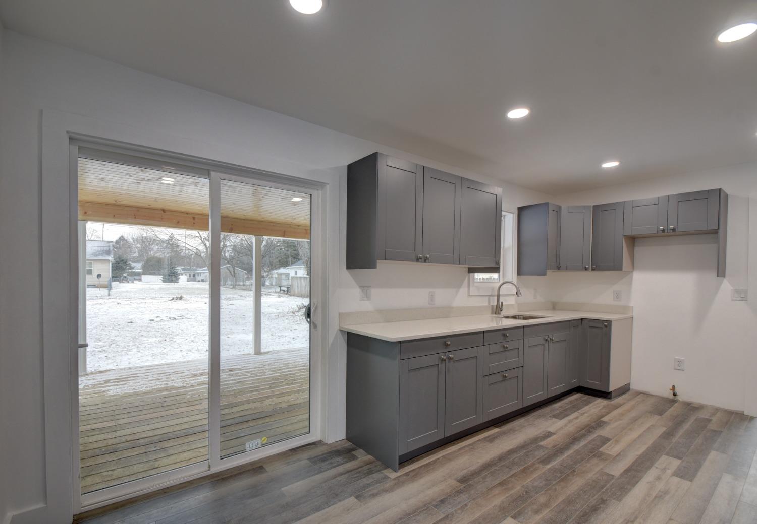 1604 Webber Street La Porte, IN 46350 - Photo 13 of 22 a kitchen with sink and refrigerator