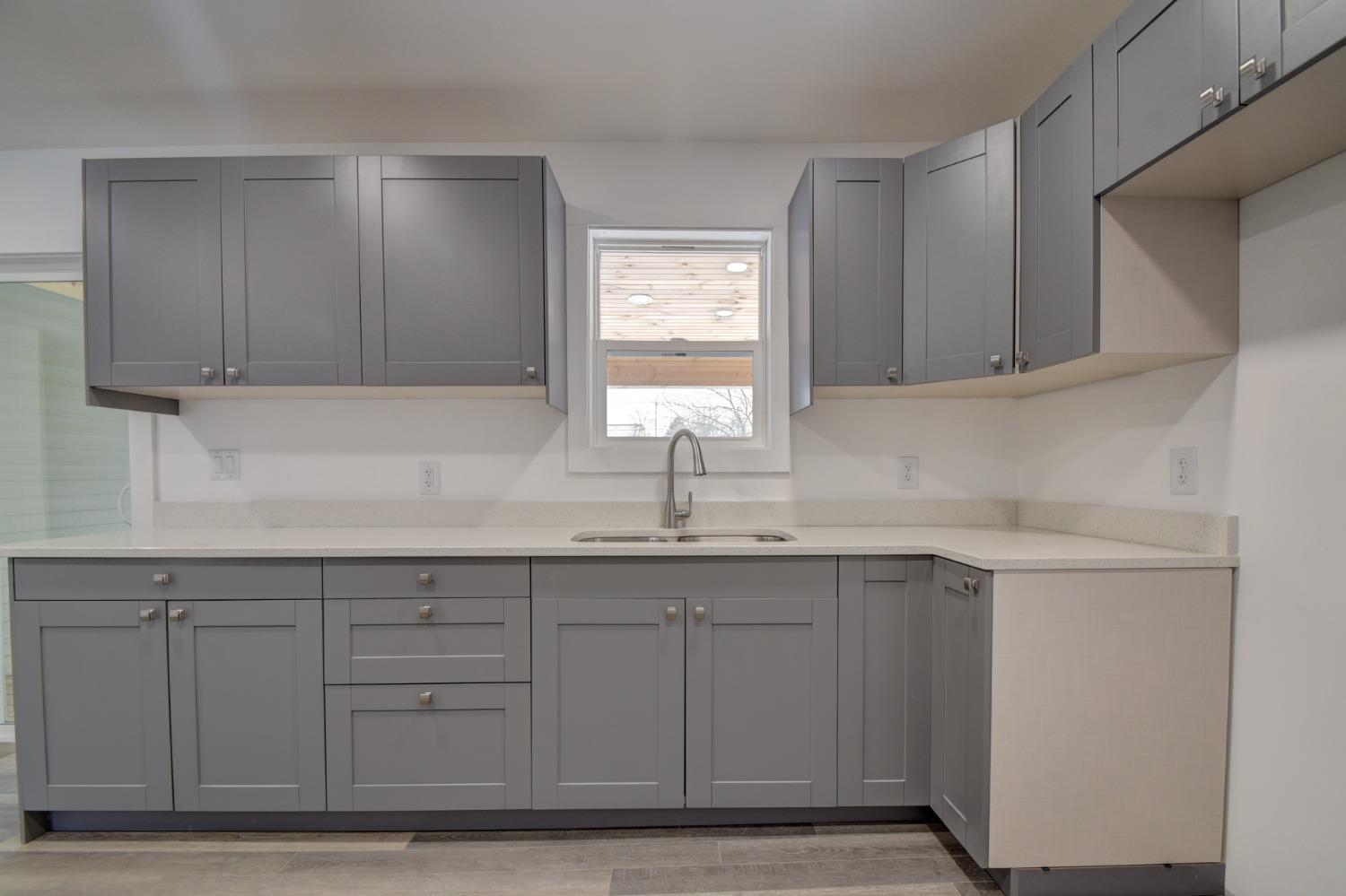 1604 Webber Street La Porte, IN 46350 - Photo 14 of 22 a kitchen with a sink cabinets and window