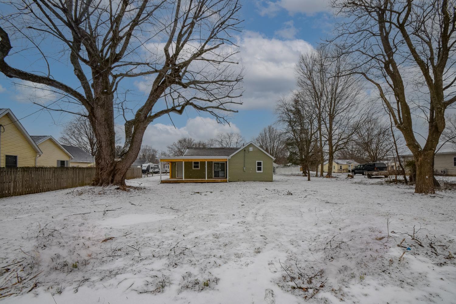 1604 Webber Street La Porte, IN 46350 - Photo 5 of 22 a view of a house with a snow in the yard