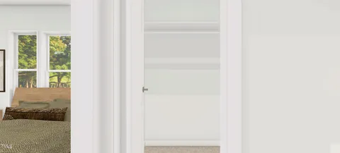 a bathroom with mirror and a sink