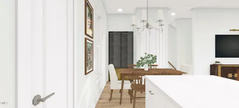 a living room with furniture a fireplace and a floor to ceiling window