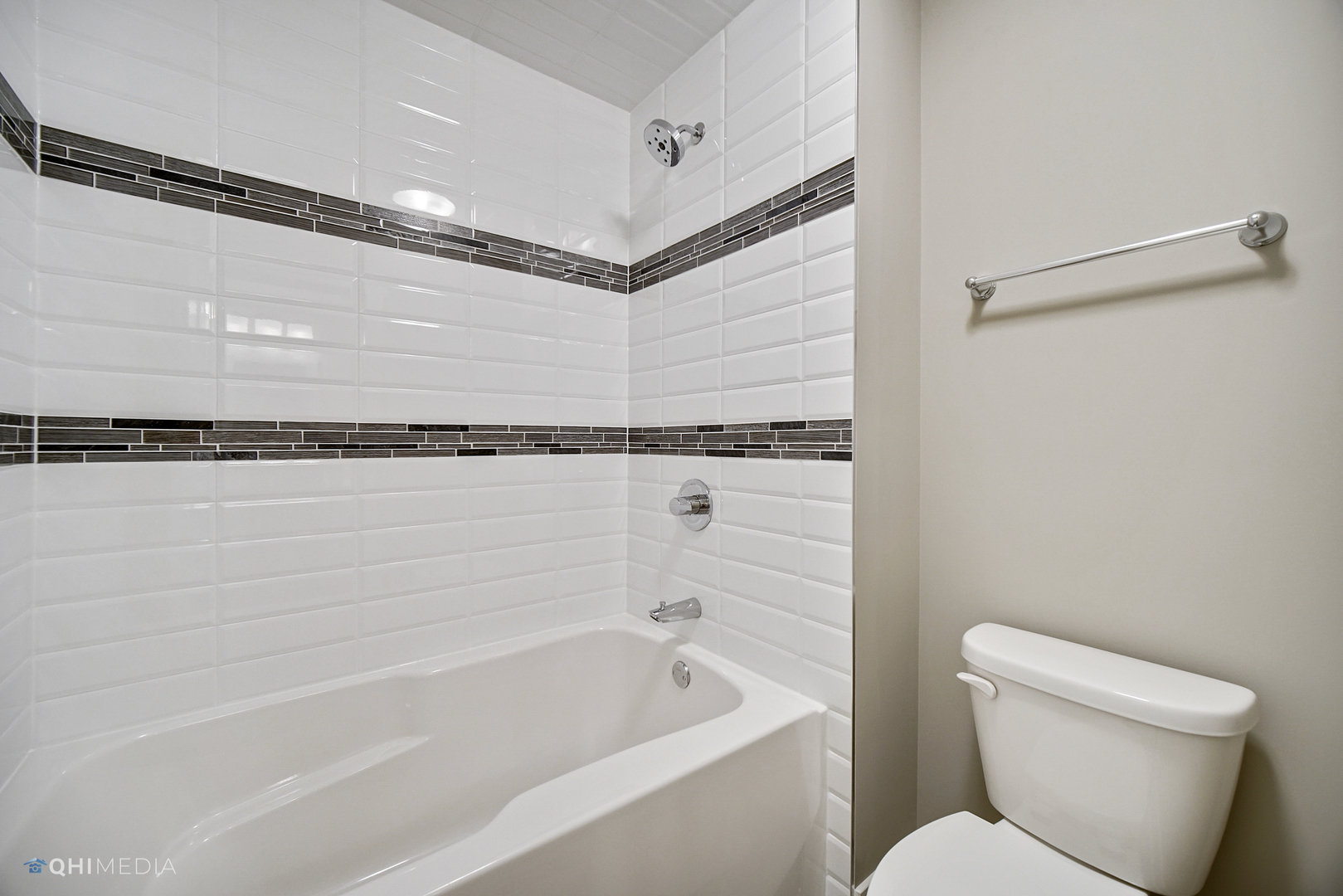8233 Castle Drive Munster, IN 46321 - Photo 12 of 19 a bathroom with a toilet and a bathtub