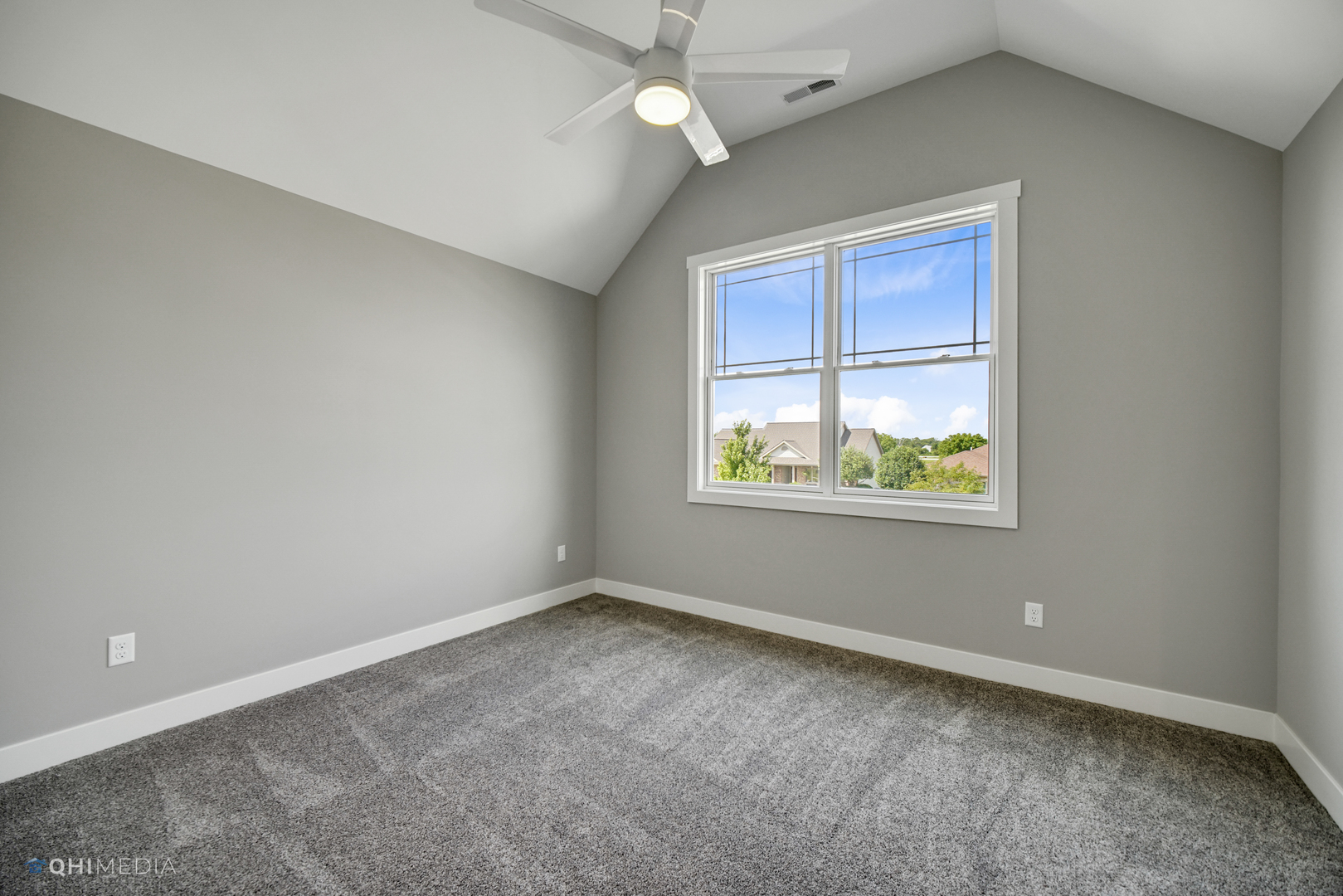 8233 Castle Drive Munster, IN 46321 - Photo 14 of 19 an empty room with a window and ceiling fan