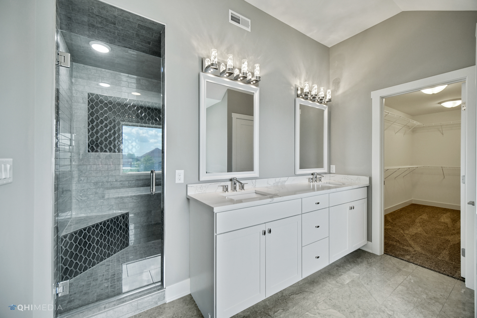 8233 Castle Drive Munster, IN 46321 - Photo 17 of 19 a bathroom with a double vanity sink and a mirror