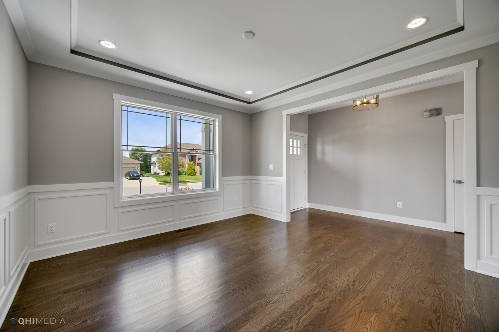 8233 Castle Drive Munster, IN 46321 - Photo 3 of 19 an empty room with wooden floor and windows