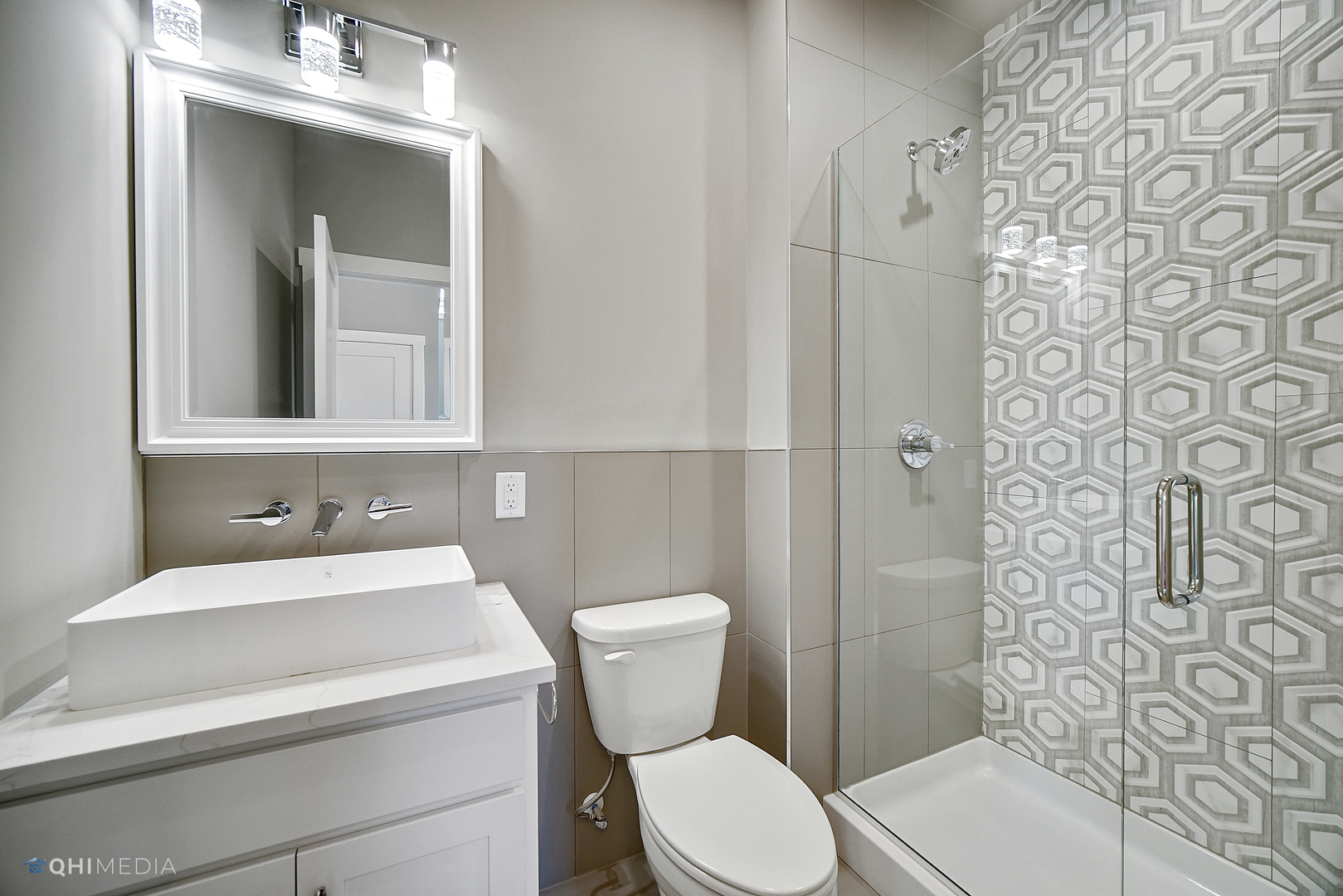 8233 Castle Drive Munster, IN 46321 - Photo 7 of 19 a bathroom with a toilet sink and shower