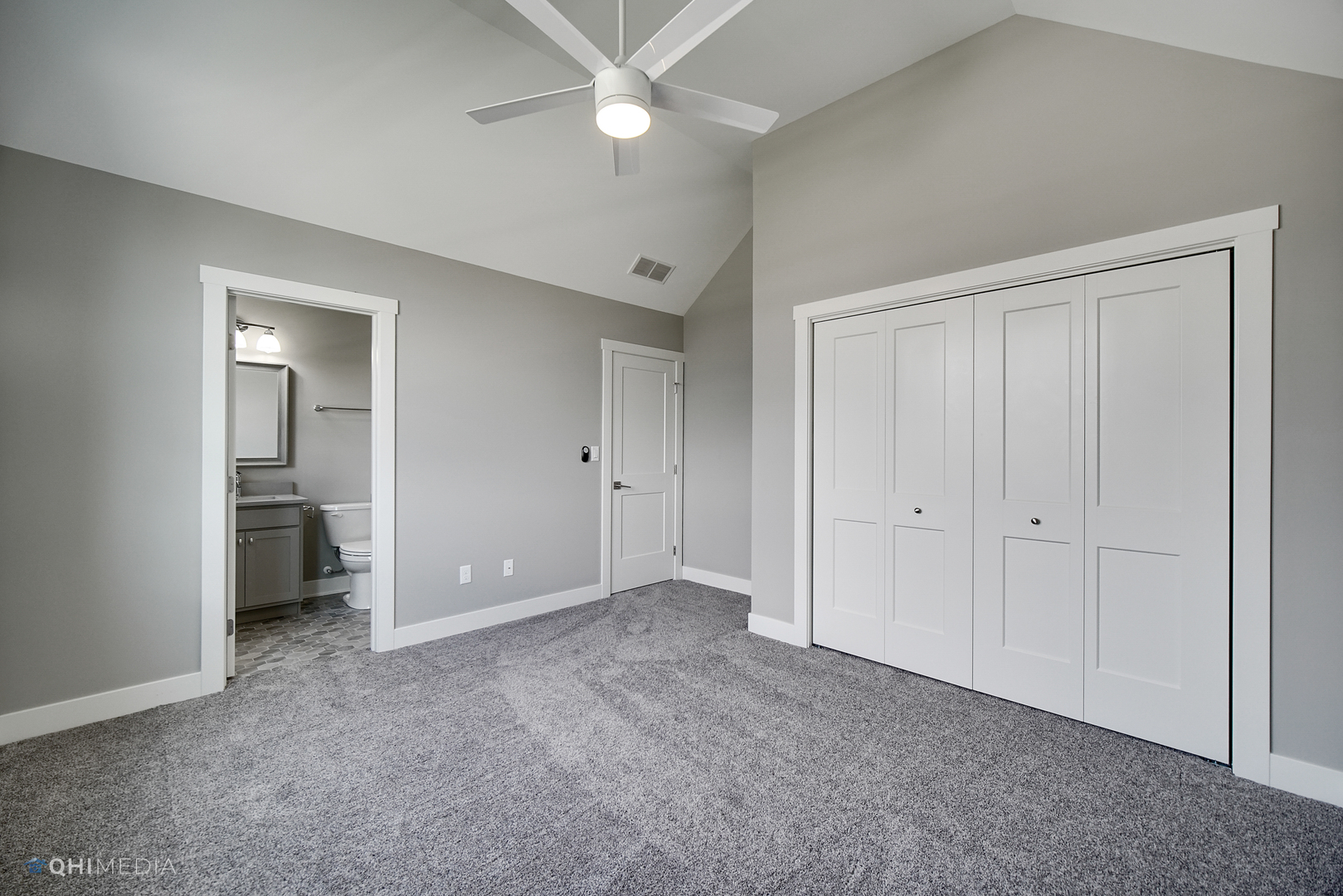 8233 Castle Drive Munster, IN 46321 - Photo 8 of 19 an empty room with closet and a ceiling fan
