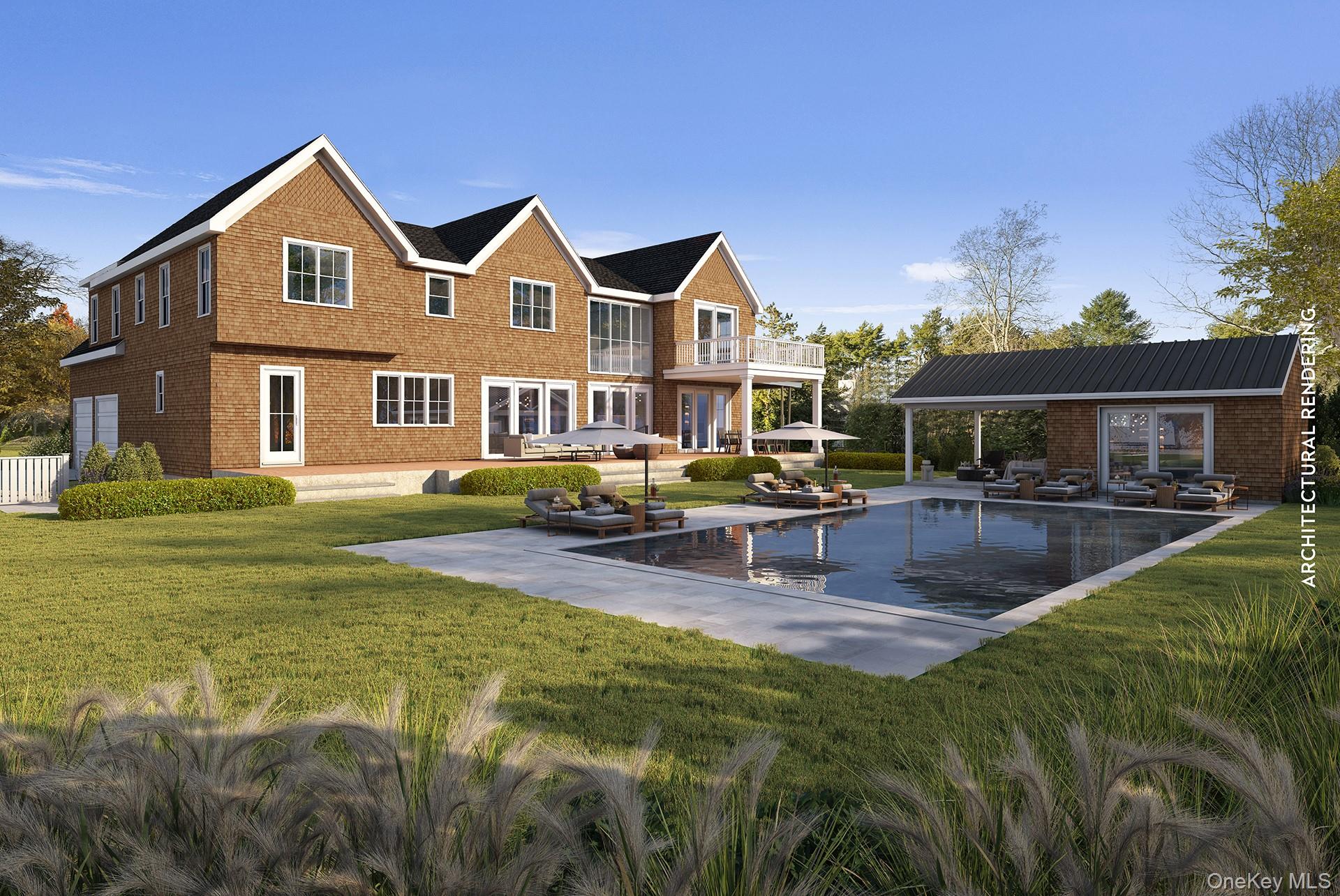 34 Old Main Road Quogue, NY 11959 - Photo 2 of 16 a view of a house with swimming pool and sitting area