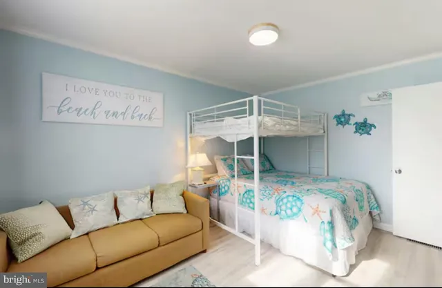 a bedroom with furniture and a bed