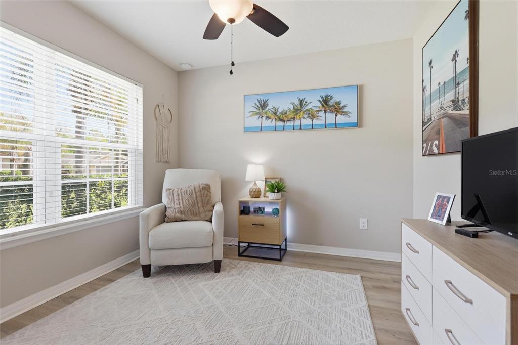 656 Carya Court DeLand, FL 32724 - Photo 17 of 28 a living room with furniture and a flat screen tv