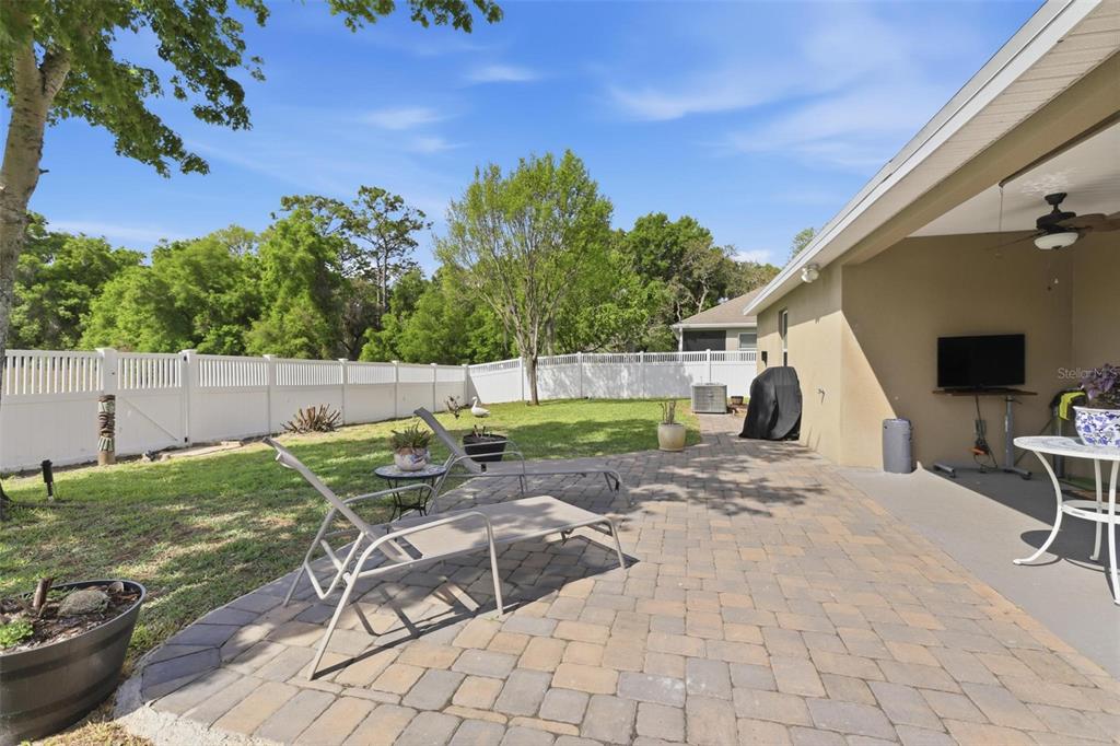 656 Carya Court DeLand, FL 32724 - Photo 25 of 28 a view of backyard with slide