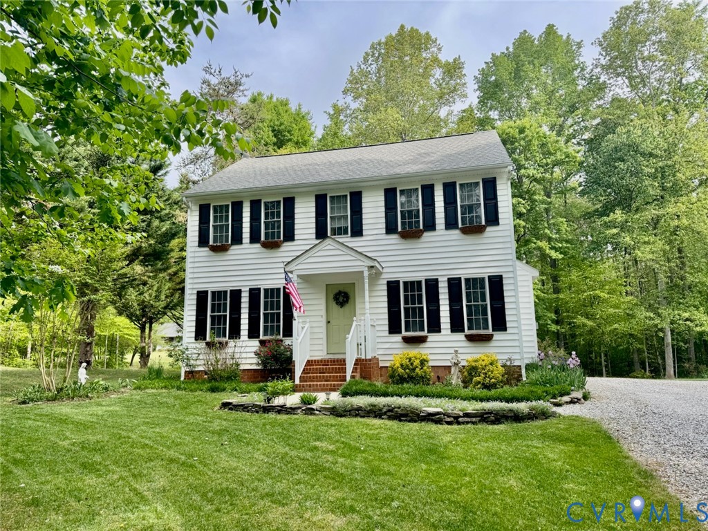1570 Rock Castle Road Goochland, VA 23063 - Photo 2 of 3 front view of a house with a yard