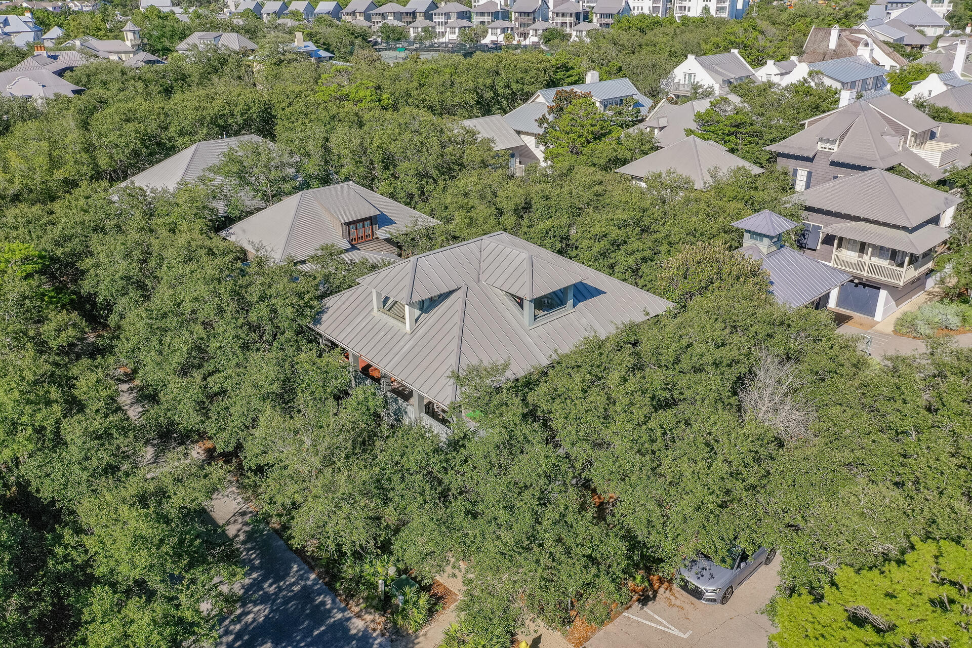 81 Round Road Inlet Beach, FL 32461 - Photo 34 of 43 an aerial view of a house with a yard and outdoor seating