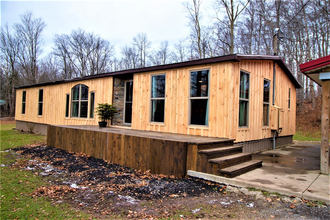 1430 Cedar Swamp Road Phelps, NY 14532 - Photo 1 of 1 Brand New Board and Batton Siding