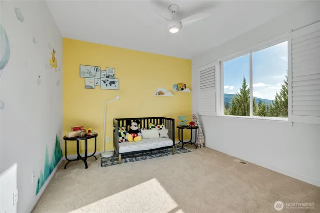 a workspace with furniture and window