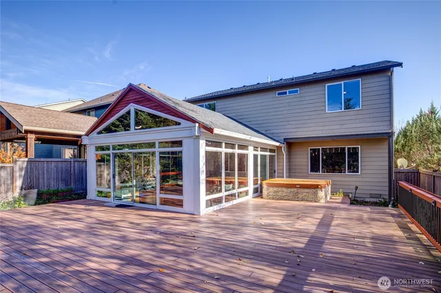 a view of balcony with wooden floor and outdoor space