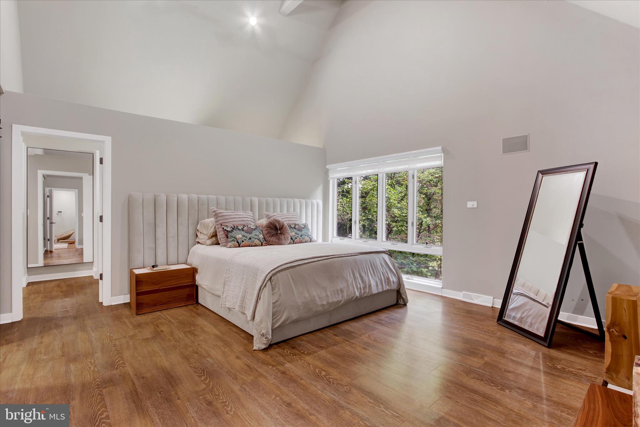 1855 Westwood Road York, PA 17403 - Photo 23 of 60 a spacious bedroom with a bed and a large window
