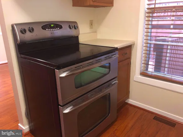 a close view of stove and microwave