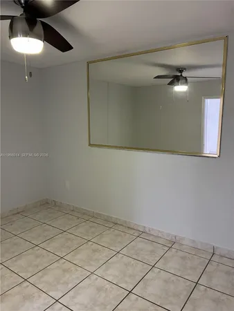 a view of a patio with a yard