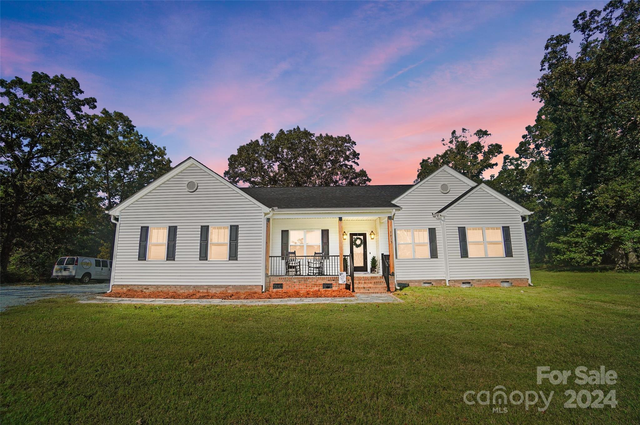 1413 Hamilton Crossroads Road Marshville, NC 28103 - Photo 1 of 42 a front view of a house with a yard