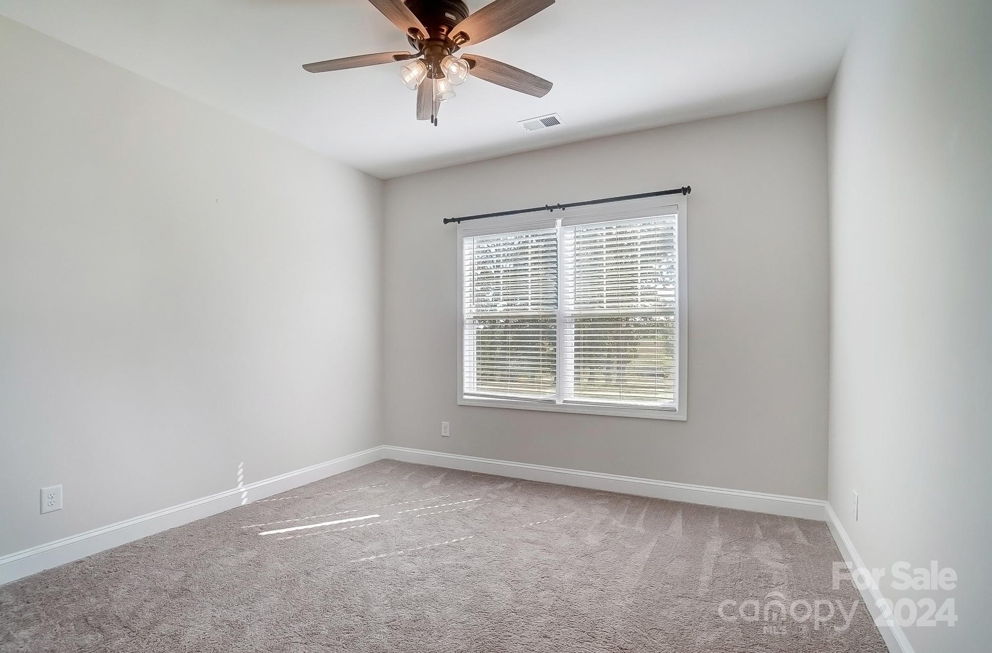 1413 Hamilton Crossroads Road Marshville, NC 28103 - Photo 31 of 42 an empty room with a window