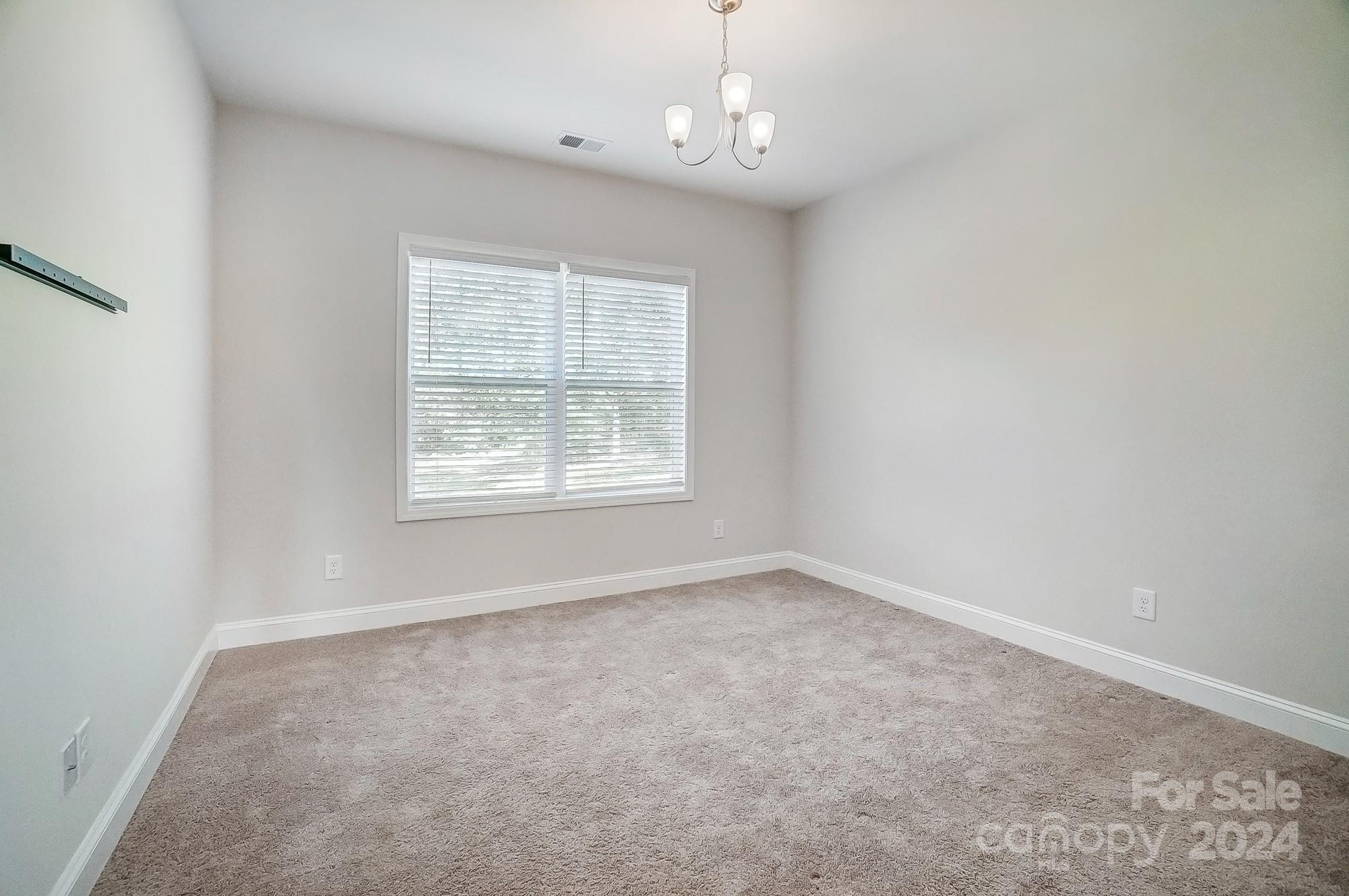 1413 Hamilton Crossroads Road Marshville, NC 28103 - Photo 34 of 42 an empty room with a window