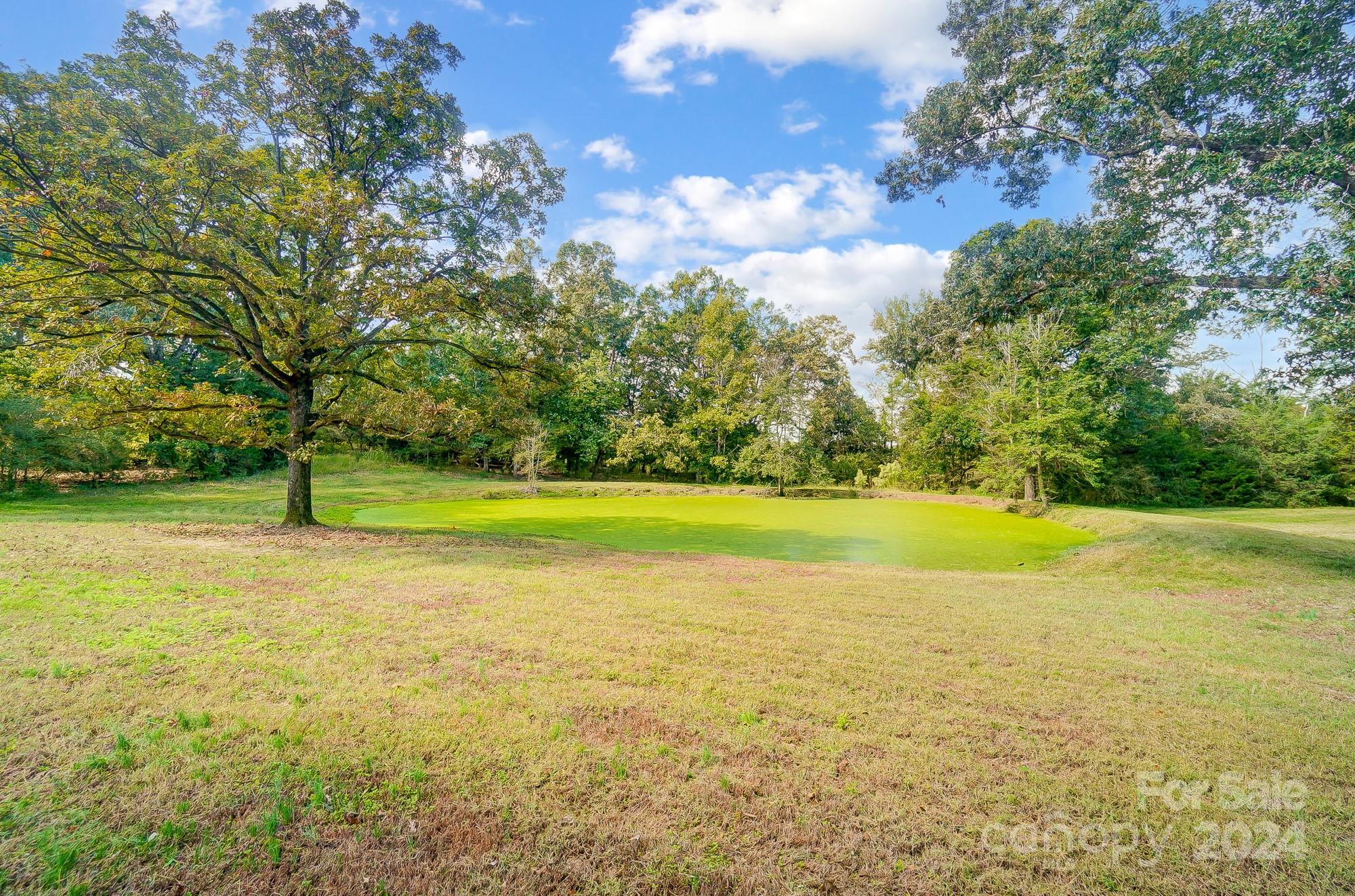 1413 Hamilton Crossroads Road Marshville, NC 28103 - Photo 41 of 42 a view of a swimming pool and an outdoor space