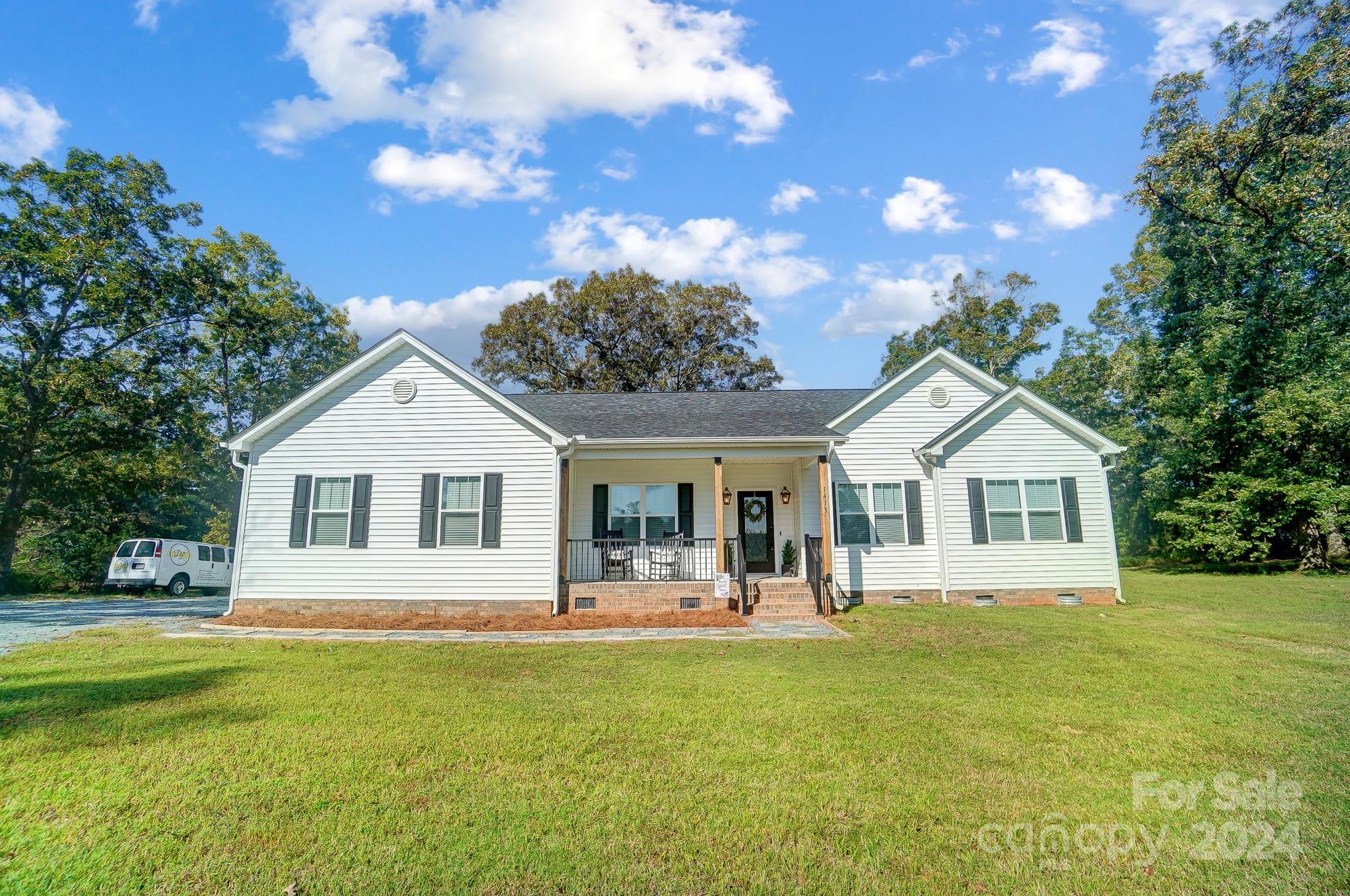 1413 Hamilton Crossroads Road Marshville, NC 28103 - Photo 5 of 42 a front view of house with yard and green space