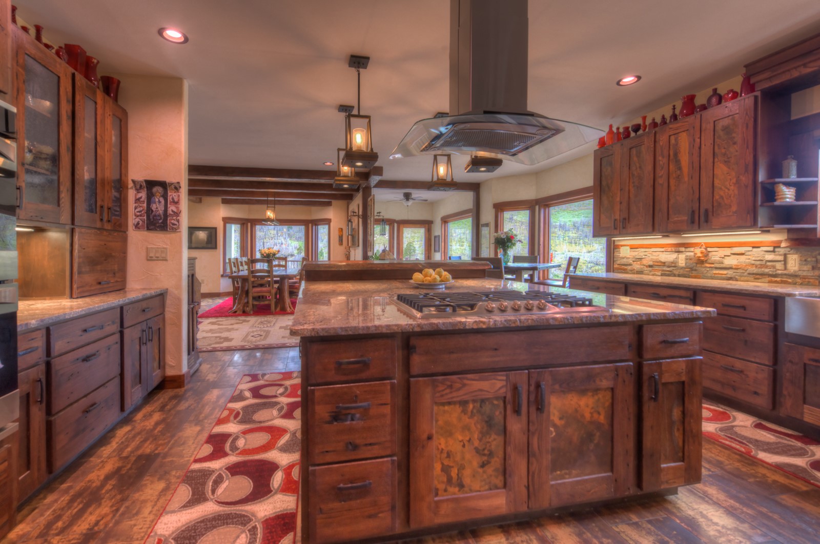 1833 Yellowstone Creek Road Walsenburg, CO 81089 - Photo 16 of 50 a kitchen with a stove a cabinets and wooden floor