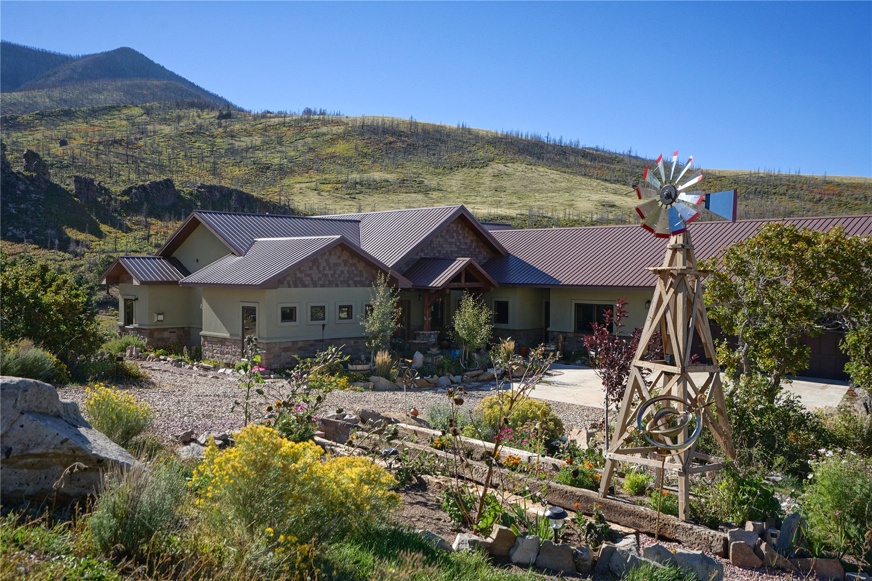 1833 Yellowstone Creek Road Walsenburg, CO 81089 - Photo 2 of 50 a view of house with yard and sitting area