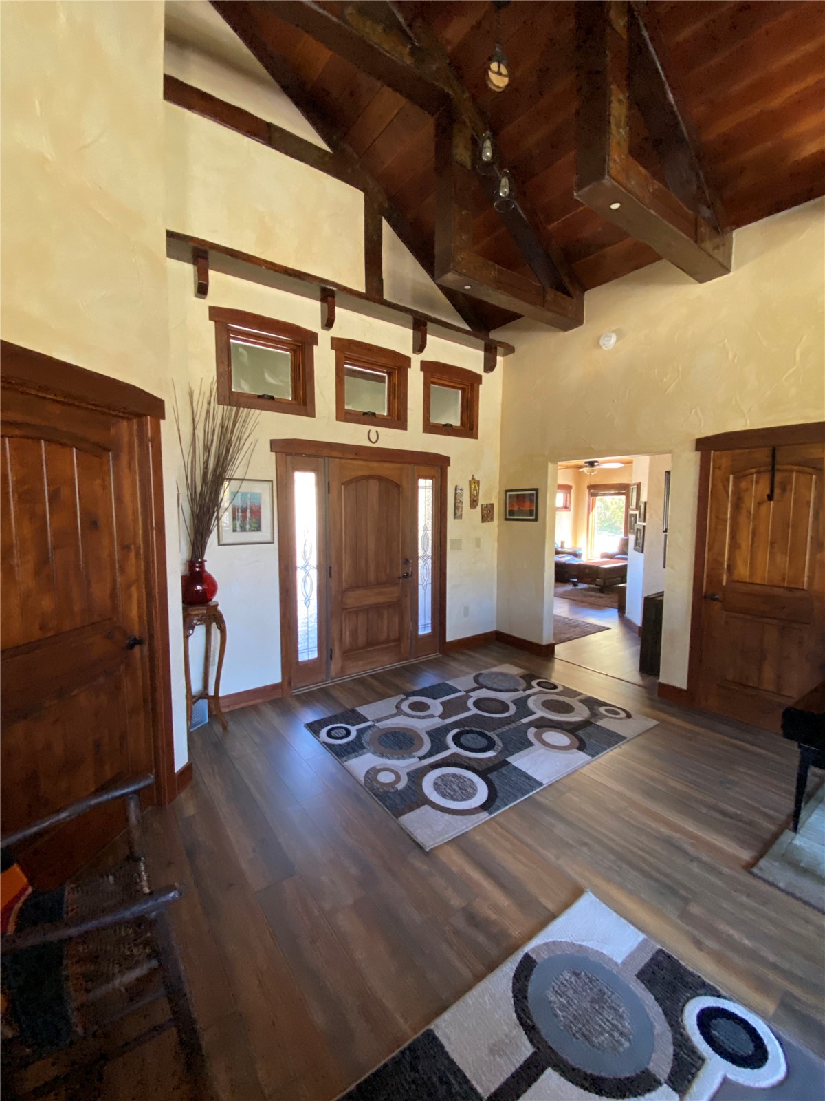 1833 Yellowstone Creek Road Walsenburg, CO 81089 - Photo 3 of 50 a view of a livingroom with wooden floor and furniture